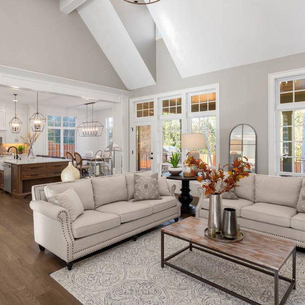 Open floor plan home, connecting the kitchen and living room together with cohesive paint and style at Hoover Paint near Central Tennessee