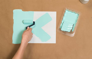 Applying paint to Sure-Swatch sample from Hoover Paint Store.